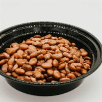 Beans · Bowl of pinto beans. Made in house.