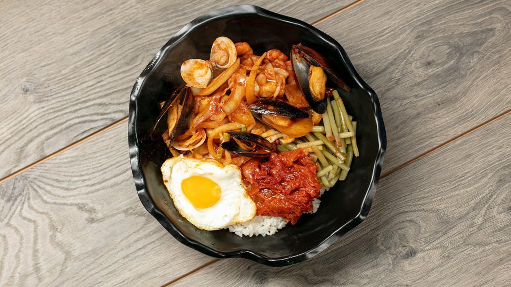 Spicy Seafood Bab · spicy seafood bowl, egg, stir fried kimchi, pickled garlic scapes, rice