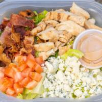 Bbq Chicken · Diced chicken breast, bacon, blue cheese crumbles, diced tomatoes, Romaine lettuce, with BBQ...