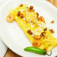Jambalaya  Shrimp Omellette · Shrimp and chicken cooked in jambalaya topped with cream cheese.