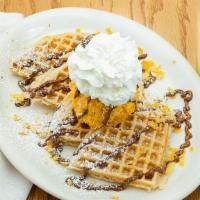 Dulce De Leche Waffle · A dulce waffle topped with ice cream.