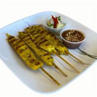 Chicken Satay (4) · Skewers of thinly sliced chicken breast, marinated in Thai spices. Served with peanut sauce ...