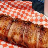 Bacon Wrapped Burrito · Carne asada burrito wrapped in bacon, with grilled Mexican salsa, guacamole, cheese and chip...