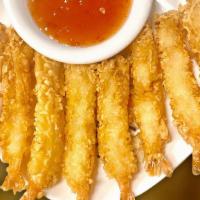 Golden Shrimp · 8 pieces of tempura shrimp deep fried and served with sweet chili sauce.