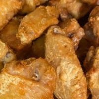 Golden Wings · 7 pieces of lightly battered, seasoned and deep-fried chicken wings served with sweet chili ...