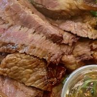 Bbq Beef · Beef brisket marinated in our special house marinade grilled, sliced, and served with our ho...