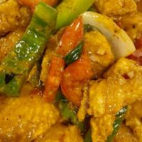 Red Curry Catfish · Lightly coated fried to a crisp catfish fillet sautéed in coconut milk and red curry, chili,...