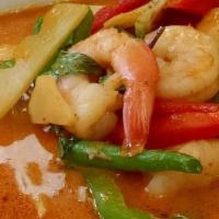 Red Curry · Red coconut curry prepared with sliced bamboo shoots, green beans, Thai eggplant, green and ...
