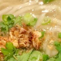 Khao Piak Sen Chicken Noodle Soup · Handmade noodles served in a savory broth and your choice of meat. Topped off with green oni...