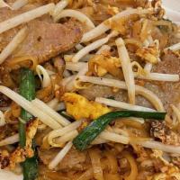 Pad Thai · Stir-fried noodles in eggs with our special pad thai sauce with nira leaves, bean sprouts, a...