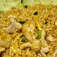 Fried Rice · Thai style fried rice with your choice of meat, eggs, and green onions.