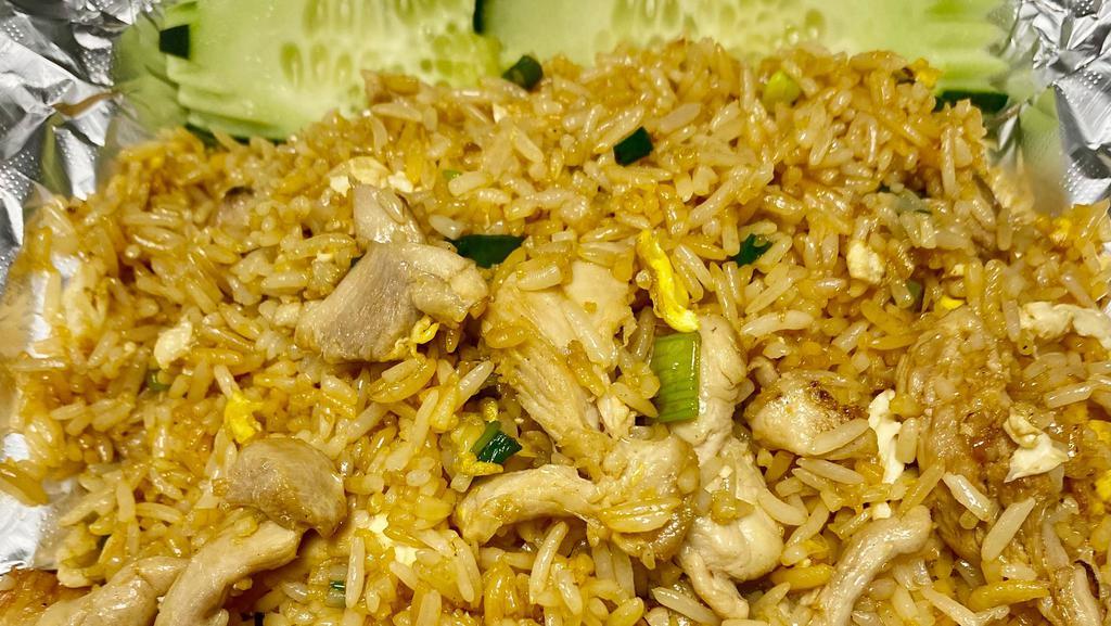 Fried Rice · Thai style fried rice with your choice of meat, eggs, and green onions.