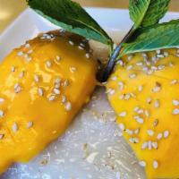Mango Sticky Rice · Sweet coconut sticky rice, served with fresh mango, coconut sauce and topped with mint and s...