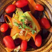 *Beet Salad · House pickled beets, cherry tomatoes, carrots, zucchini, candied walnuts, micro greens, must...