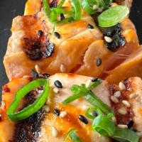 *Bbq Salmon · 4pc lightly grilled salmon. Spicy red sauce, green   onion, sesame seeds.