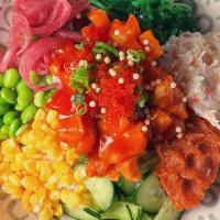 *Poke Bowl · Medley of tuna, salmon, & yellowtail, spicy tuna, crab mix, cucumbers, wakame, corn, green o...