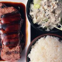 *Beef Teriyaki · Grilled NY steak, teriyaki glaze, cabbage salad, house sesame dressing, miso soup.