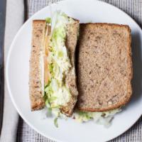 Egg Salad Sandwich · Includes mayo, mustard, lettuce, tomato, onion and choice of cheese and bread.