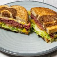 Pastrami Sandwich · Includes mayo, mustard, lettuce, tomato, onion and choice of cheese and bread.
