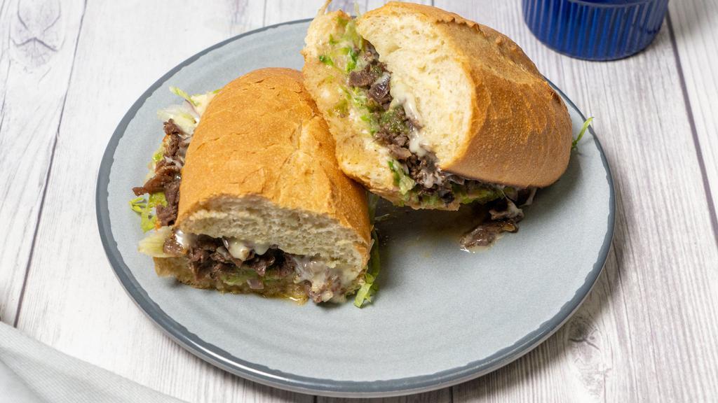Philly Cheesesteak Sandwich · With provolone cheese on French roll.