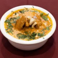 Chicken Korma · Cooked in a sinfully rich nutty sauce.
