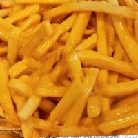 Whiz Fries · Cheese Whiz covered fries.