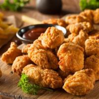Popcorn Chicken · Small, bite-sized pieces of chicken that have been breaded and fried.