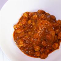 Channa Masala · Garbanzo beans cooked in a special blend of Indian spices.