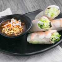 Spring Rolls · Shrimp and Pork wrapped with Lettuce, Mint Leaves, Bean Sprouts, and Rice Vermicelli all in ...