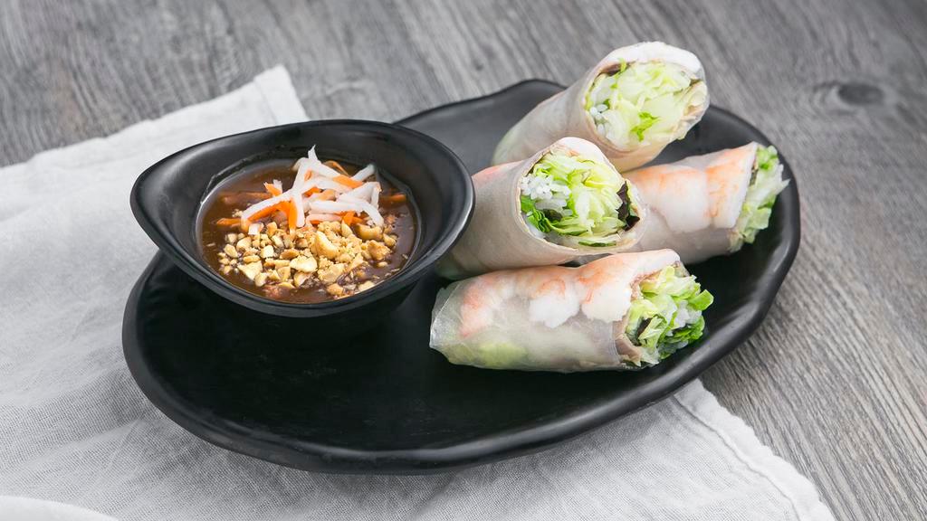 Spring Rolls · Shrimp and Pork wrapped with Lettuce, Mint Leaves, Bean Sprouts, and Rice Vermicelli all in Rice paper.