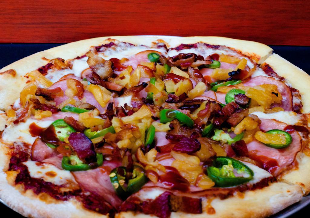 Angry Hawaiian · Shredded mozzarella, ham, bacon, jalapenos, roasted pineapple and a spicy BBQ drizzle.