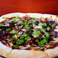 Smokey The Pig · BBQ sauce, BBQ pork, house smoked bacon, caramelized onions topped with green onions.