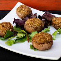 Stuffed Mushrooms · Spinach and goat cheese stuffed mushrooms breaded and baked.