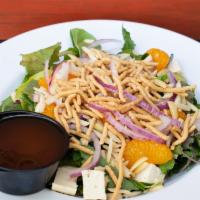 Asian Spring Salad (Full) · Bed of spring mixed greens with mandarin oranges, red onions, roasted almonds, tofu with cri...