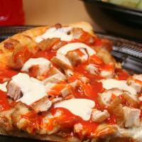 Buffalo Chicken Spicy Pizza · Mozzarella cheese, diced chicken breast marinated in buffalo hot sauce, black pepper, and cr...
