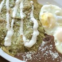 Chilaquiles Rojo O Verdes · Corn chips with red or green sauce.