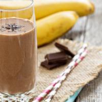 Chocolate Banana Smoothie · Delicious smoothie made with frozen bananas, cocoa powder and milk.