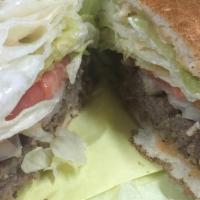 Hamburger · One patty, 1000 Island, raw onion, tomato, and lettuce.