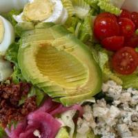 Side Salad · Mixed greens, radishes, baby tomatoes, onions, served with ranch dressing.