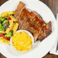 Louis Ribs · Our tender pork ribs are seasoned with special rub then slow-smoked to perfection! They're s...