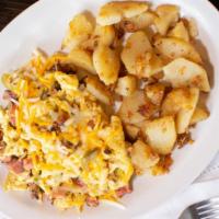 Mexican Scramble · Diced ham and jalapeno peppers scrambled in three eggs and smothered with jack and cheddar c...
