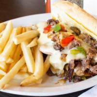 Philly Cheese Steak · Tender thinly sliced beef with grilled bell peppers, onions, mushrooms, & melted swiss chees...