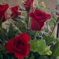 A Dozen Red  Roses With Baby Blue Eucalyptus. · Beautiful floral arrangement made with a dozen roses, baby blue eucalyptus and lemon leaf. C...