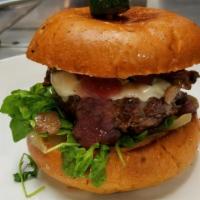 Winemaker Burger · 1/2lb angus beef, mushrooms, onion, arugula, white cheddar, cabernet reduction in a pink pep...