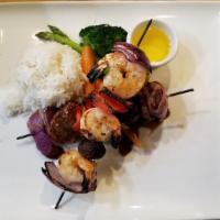 New! Steak And Shrimp Skewers [Gf] · filet mignon skewer and shrimp skewer, jasmine rice, veggies. Gluten-Free