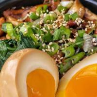 Chicken Bowl · Chicken thigh, soft boiled egg, green onion, cooked spinach and rice.