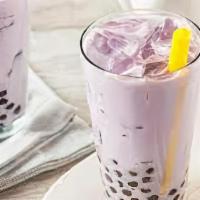 Taro Shake · 24 ounce taro flavored yogurt drink with your choice of mango or strawberry pearls.