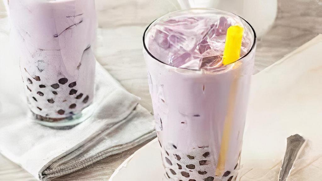 Taro Shake · 24 ounce taro flavored yogurt drink with your choice of mango or strawberry pearls.