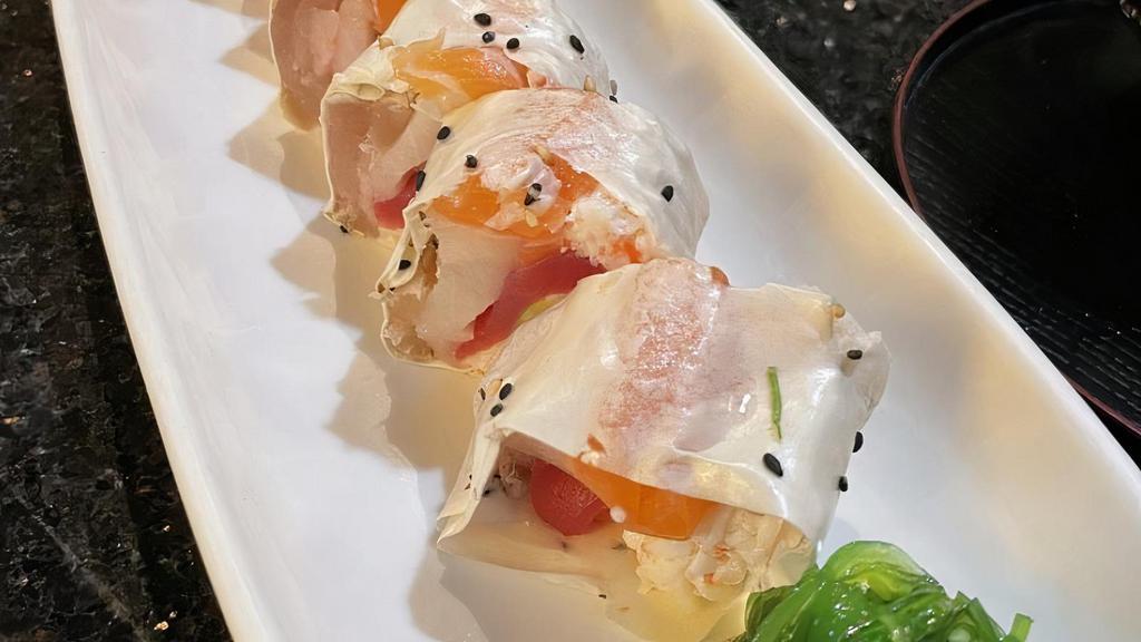 Sashimi Roll · Tuna, salmon, yellowtail, albacore sashimi, cucumber, avocado crab meat on soy paper and rolled. (no rice).