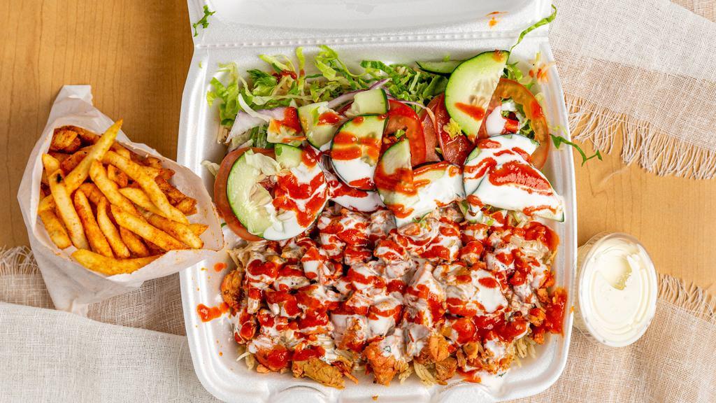 Mf Mix Platter · Served with Seasoned white rice, chicken & lamb, side of salad and topped with tzatziki sauce and red sauce.